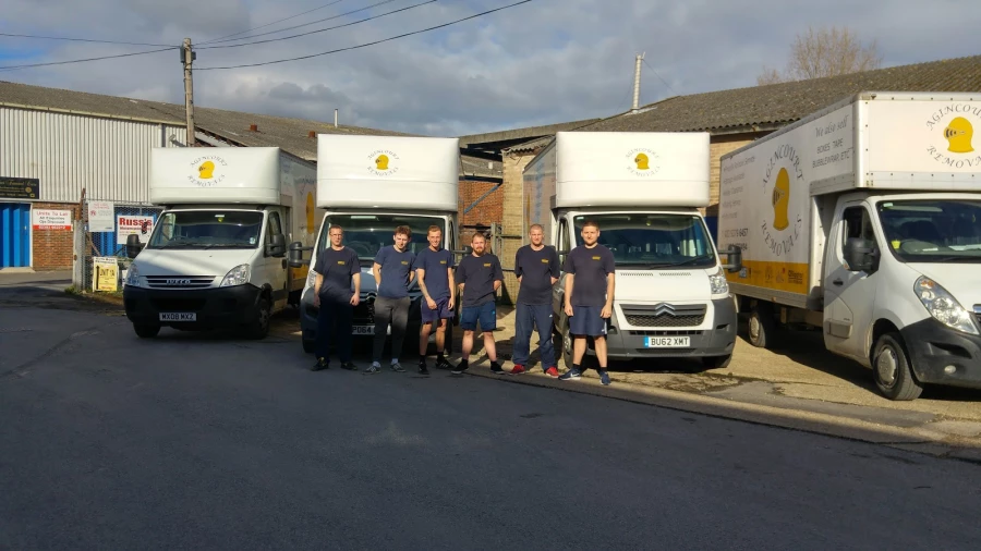 Agincourt Removals team standing with the company fleet
